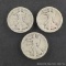 Three Walking Liberty silver half dollars, 1917, 1918, 1920.
