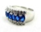 Seller's description states 'blue sapphire cz band/ring, size 8'.