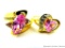 Two rings. Seller's description states 'marquise cut pink topaz, size 9; pink heart shaped topaz,