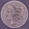 1900 O Morgan silver dollar.