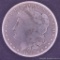 1885 S Morgan silver dollar.