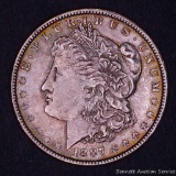 1887 Morgan silver dollar.