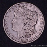 1881 O Morgan silver dollar.