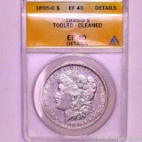 Slabbed and graded 1895 O Morgan silver dollar