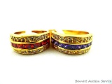 Two rings. Seller's description states 'purple amethyst ring, size 12; red ruby ring, size 12'.