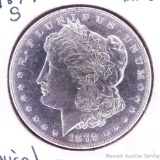 1879 S Morgan silver dollar. Flip is marked 'Mint State' and we would agree. Very nice coin.