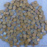 Over 2 pounds of unsearched wheat pennies. Scooped from an ice cream bucket that sat in Seller's