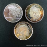 Three 1 oz silver rounds, .999 fine. Styles including Buffalo nickel, Liberty dollar, Morgan dollar.