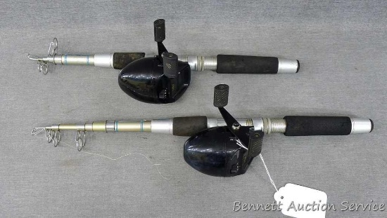 Two telescoping fishing rods with Zebco reels. 6' 4" long.