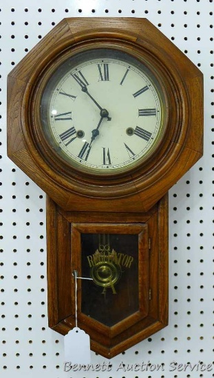 Regulator School House clock. Approx. 13" w x 22-1/2" l. Seller states runs good and chimes on the