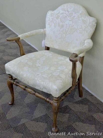 Beautiful vintage chair with cream floral upholstery. Chair is approx. 29" w x 35" h. Has some wear
