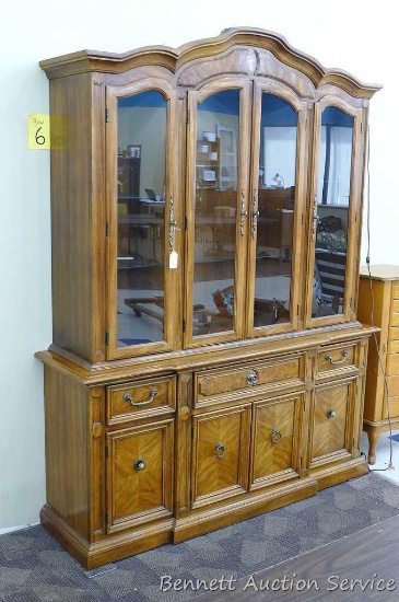 Gorgeous Preferred Editions lighted hutch with glass shelves. Approx. 66-1/2" l x 18" d x 7' 1" h.