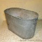 Antique galvanized boiler is approx. 2' wide and looks to be still water-tight. Better shape than