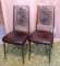 Pair of funky kitchen chairs with cool flower backs. Both are sturdy and in good shape.