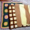 Three handmade afghans are all in good condition. Largest is the darker brown and cream colored