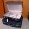 Pair of hard side American Tourister suitcases, larger is 20