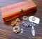 Neat little cedar box with four pretty brooches, plus a clip style bookmark and a gold tone ring.