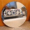 Neat mirror with beveled edge is 24