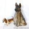 German Shepard and basset hound figures are both marked 'Japan'. German Shepard stands 7-3/4