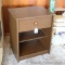 End table with drawer is fairly sturdy and in overall decent shape - front corner trim has been