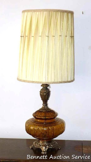 Wonderful vintage table lamp stands 39" as currently set up. Great amber glass base.