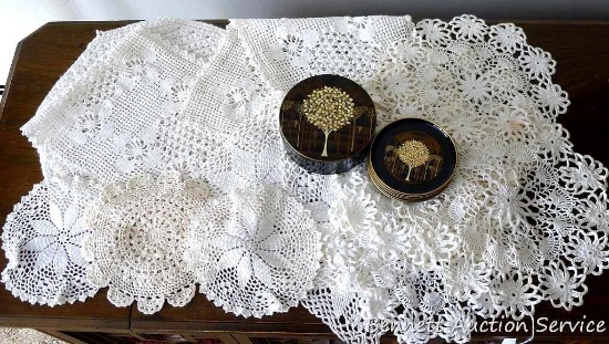 Three rectangular doilies up to 26"; plus a variety of round doilies up to 12" diameter. Set of six