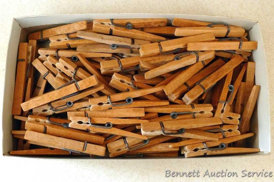 Collection of heavy duty wooden clothespins. Box measures approx. 11" x 6" x 2-1/2".