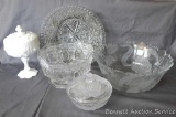 Three pressed glass serving bowls; milk glass footed candy dish; frosted glass covered candy dish.