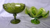 Green glass footed compote, plus ruffled edge green glass footed dish. Chip noted on rim of ruffled