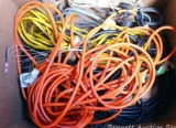 Assortment of extension cords including from 25' to 50'.