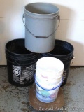 Three 5 gallon buckets, rolling plant dolly; and 5 ice cream buckets.