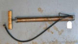 Vintage Golden Rod hand air pump holds pressure.