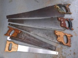 4 Vintage hand saws, longest is 28