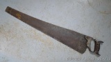 Vintage metal handled rip saw is 34