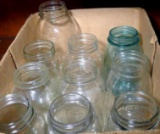 Seven Ball or Kerr quart canning jars; Kerr 1-1/2 quart canning jar; plus two others. One blue Ball