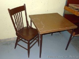 Handy little folding table and sturdy wooden kitchen chair. Table is 2-1/2' square.