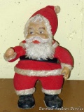 Somewhat alarming stuffed antique Santa stands 14