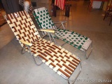 Two folding lounge chairs. Webbing and frames look good.