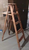 5 ft wooden step ladder is fairly sturdy and in good condition.