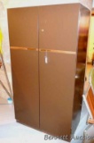 Nice lockable steel wardrobe cabinet has an interior shelf, clothes rod, boot rest and more. Key not