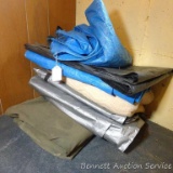 Canvas and poly garden tarps, plus a moving blanket. Condition and sizes unchecked, take your