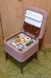 Retro sewing stool. Top lifts for storage and includes some sewing notions such as crochet thread,