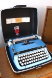 Smith Corona Sterling student size typewriter in carry case. Case measures approx. 15