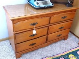 Nice sized solid wood six drawer dresser is in very good shape. All drawer slide as they should.