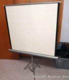 Wards projector screen folds for easy storage. Sturdy piece in good condition