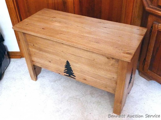 Beautiful wooden bench with tree design. Lid lifts up with storage underneath. Approx. 30-1/2" l x