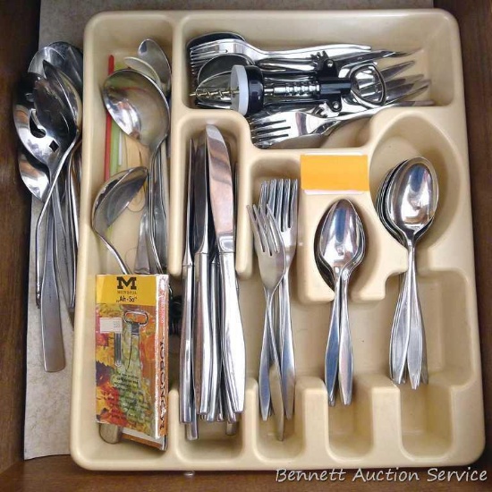 Nice set of Oneida stainless flatware and more. There are 11 matching forks and knives.