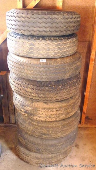 6 Trailer tires and rims, 8-14.5, some appear to hold air, are not weather checked; and 1-14.5 tire