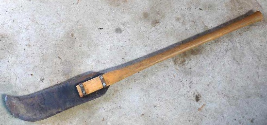 Brush axe is 48" long and appears in good shape.