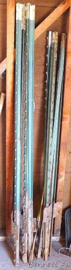 Assortment of metal fence posts including four 6' and four 5-1/2'.
